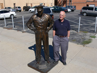 Ronald beside statue of Eisenhower in Rapid City