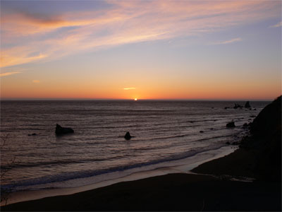 The sun sets over the Pacific off the California coast 