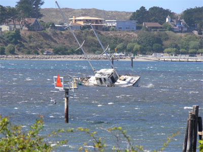 Concrete yacht beached on a sand bar 