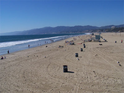 Looking north along Santa Monica beach. Lots of guard posts. 