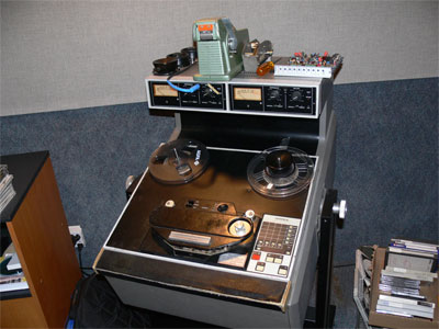 Nestor's reel to reel. Once in a while a digital file is corrupted and he take the original reel to reel and recreated the digital file. The reels are first "cooked" to get rid of the moisture and then put on the machine here. 