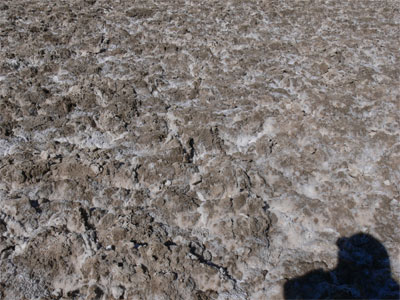 The valley floor was covered in crusted, dirty salt. 
