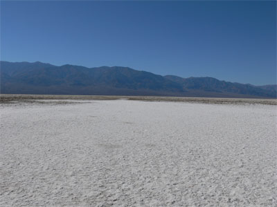Walkway out onto the salt flat. The white trail is where people have tamped down the salt, and the gray border is where no one has walked.